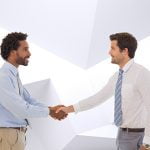 Businessmen shaking hands with each other