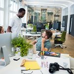 Group of business executives interacting with each other