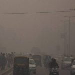 New Delhi street covered with dense  smog